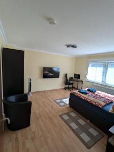 Μια τηλεόραση ή/και κέντρο ψυχαγωγίας στο SK Apartments - Schalke +3 φωτογραφίες