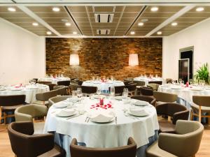 Reštaurácia alebo iné gastronomické zariadenie v ubytovaní Mitico Hotel & Natural Spa