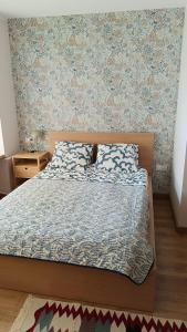 Ένα ή περισσότερα κρεβάτια σε δωμάτιο στο Apartament Królewiecka przy czołgu