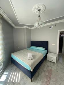 Ένα ή περισσότερα κρεβάτια σε δωμάτιο στο İlkay Apart