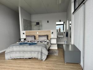 Postel nebo postele na pokoji v ubytování Die Uitzicht Guesthouse - Knysna + 37 fotografií