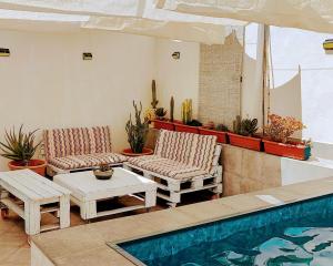Bazén v ubytování Villa Yandre Garden House - Ayamonte nebo v jeho okolí
