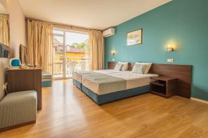 Postel nebo postele na pokoji v ubytování Valeo Hotel