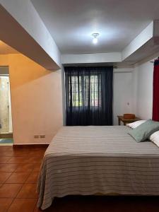 Katil atau katil-katil dalam bilik di DiNancyCasolare - La Colonia, SC