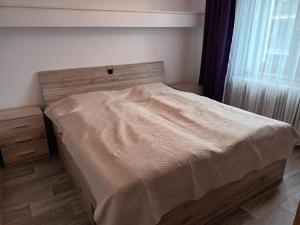 Postel nebo postele na pokoji v ubytování Byt v řadovém domě