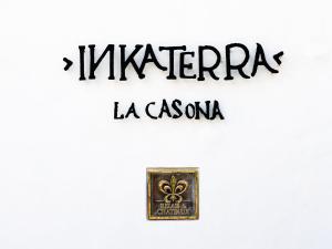 a sign that reads kirkenazi la casseroma at Inkaterra La Casona Relais & Chateaux in Cusco