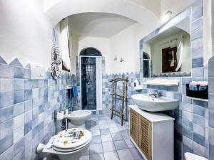 Kúpeľňa v ubytovaní Familyhouse Pevero Hill Porto Cervo + 16 fotografií