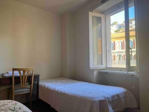 Postel nebo postele na pokoji v ubytování Sunny apartment in Lugano
