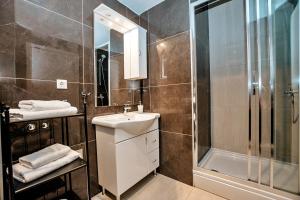 Kúpeľňa v ubytovaní CentRooms Kovac1