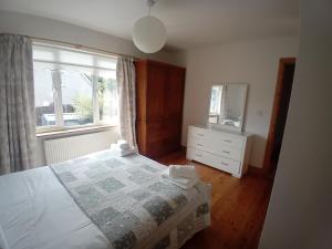 Postel nebo postele na pokoji v ubytování Comfortable House