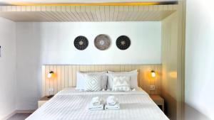 Postel nebo postele na pokoji v ubytování Moonlight Bay Resort + 12 fotografií