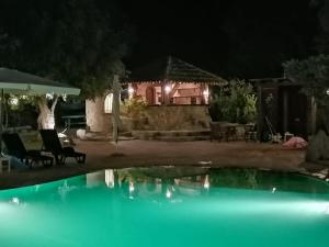 Bazén v ubytování Residenza La Vigna nebo v jeho okolí