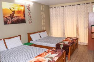 Uma cama ou camas num quarto em Themapleview