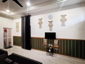 Μια τηλεόραση ή/και κέντρο ψυχαγωγίας στο Mini Concept Hotel