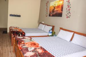 Uma cama ou camas num quarto em Themapleview