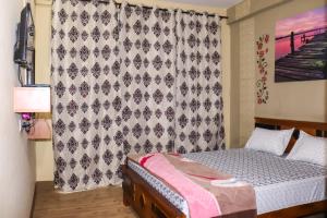 Uma cama ou camas num quarto em Themapleview