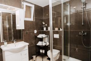 Kúpeľňa v ubytovaní CentRooms Kovac1