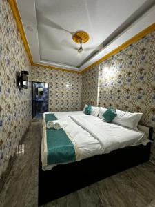 Postel nebo postele na pokoji v ubytování Baga Beachway, GuestHouse