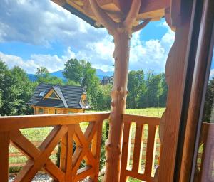 Balkón alebo terasa v ubytovaní Góralska Chatka 2 Highland Cottage - Split AC, Jacuzzi, Sauna, Private parking, Mountains View, Garden, Zakopane