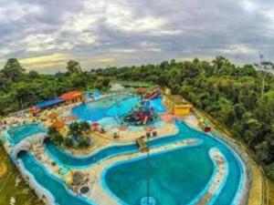 an overhead view of a large water park at NASUHA HOMESTAY 3 TEMERLOH Semi-D House, 3 Bedroom, 2 Bathroom, 4 Unit Aircond, Free Wifi and Netflix in Temerloh