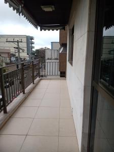 En balkon eller terrasse på Apto praia do forte + 3 billeder