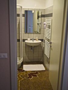 Kúpeľňa v ubytovaní B&B Cernaia 42 + 37 fotografií