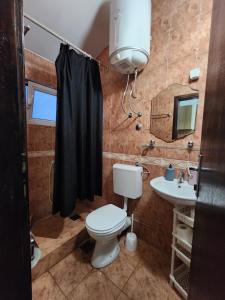 Koupelna v ubytování Bozovic Apartments I