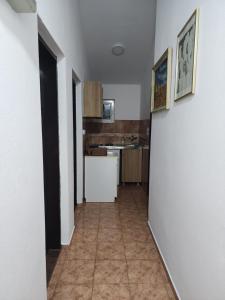 Kuchyň nebo kuchyňský kout v ubytování Bozovic Apartments I