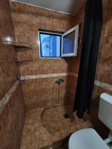 Koupelna v ubytování Bozovic Apartments I