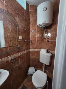 Koupelna v ubytování Bozovic Apartments I