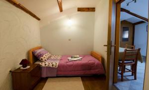 Postel nebo postele na pokoji v ubytování Apartments Percic