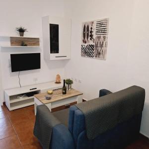 TV a/nebo společenská místnost v ubytování Apartamento ROSA BEACH