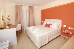Posteľ alebo postele v izbe v ubytovaní Hotel Ilion