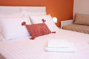 Posteľ alebo postele v izbe v ubytovaní Hotel Ilion