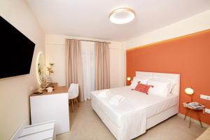Posteľ alebo postele v izbe v ubytovaní Hotel Ilion