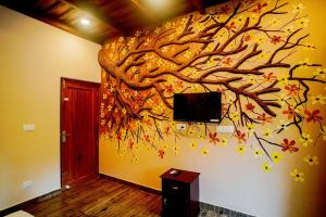 TV a/nebo společenská místnost v ubytování Falcon Riverview Resorts