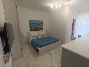 Postel nebo postele na pokoji v ubytování La casa di mest Pepp