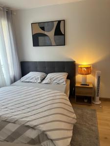 Postel nebo postele na pokoji v ubytování Champion suites