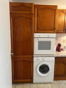 Kuchyň nebo kuchyňský kout v ubytování Champion suites