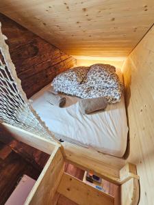 Postel nebo postele na pokoji v ubytování Tiny house La Grange Inden