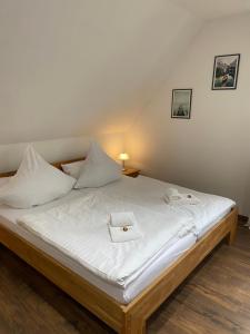 Ένα ή περισσότερα κρεβάτια σε δωμάτιο στο OK Apartment Minden