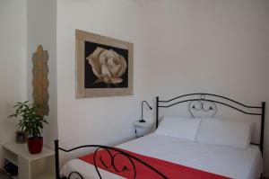 Postel nebo postele na pokoji v ubytování Villa Aripè