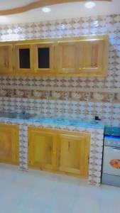Η κουζίνα ή μικρή κουζίνα στο Appartement meublé