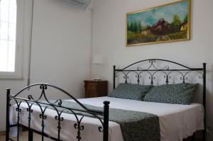 Postel nebo postele na pokoji v ubytování Villa Aripè