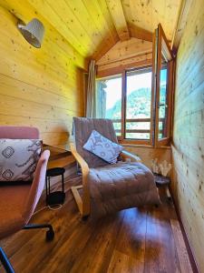 Posezení v ubytování Tiny house La Grange Inden