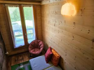 Postel nebo postele na pokoji v ubytování Tiny house La Grange Inden