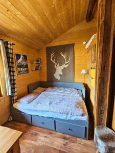 Postel nebo postele na pokoji v ubytování Tiny house La Grange Inden