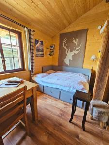 Postel nebo postele na pokoji v ubytování Tiny house La Grange Inden
