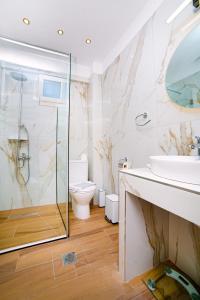 Kúpeľňa v ubytovaní Hotel Ilion + 37 fotografií