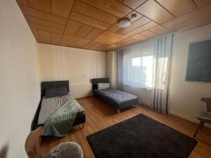 Postel nebo postele na pokoji v ubytování Ruhige Wohnung im Leinebergland